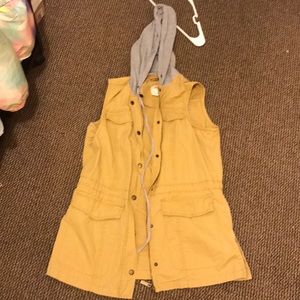 Hooded brown and gray jean jacket .